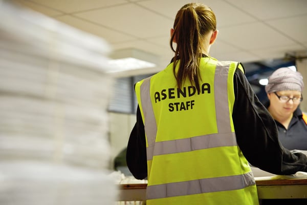 Asendia employee working mail